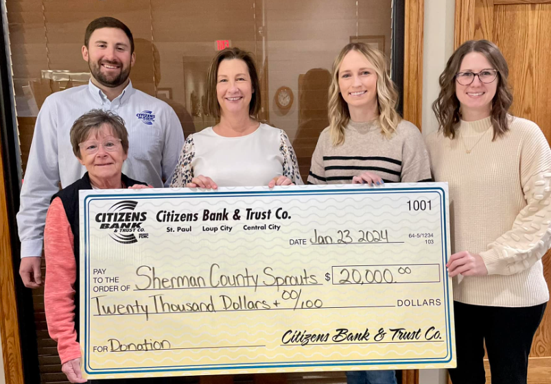 Citizens Bank & Trust Co. staff presented a $20,000 check to the Sherman County Sprouts child development center.