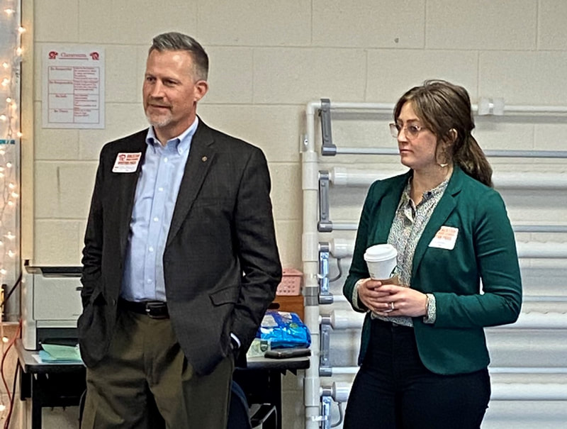 Chris Kalkowski (left) and Kara Geweke from First National Bank of Omaha recently presented on ag-related topics to students at Ralston High School.
