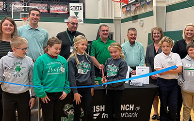 Frontier Bank staff opened an in-school savings bank at an elementary school in Falls City.