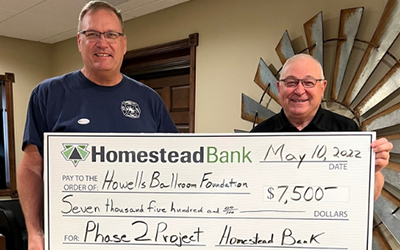 Homestead Bank in Howells presented a $7,500 check to the Howells Ballroom Foundation.