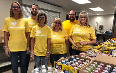 Homestead Bank staff volunteered at a local food pantry.