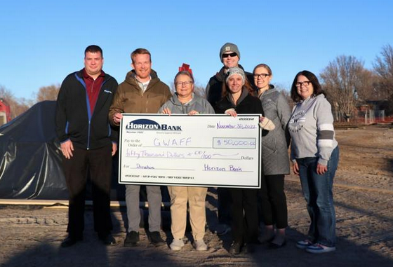 Horizon Bank staff donated $50,000 to the Waverly Aquatic Center.