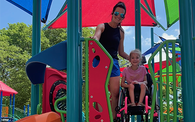 Brianna Lofgren, a mortgage with i3 Bank in Bennington, and her daughter, Niriah, enjoy the independence and mobility the new park provides.