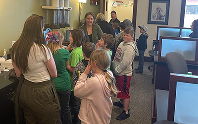 Homestead Bank staff hosted second-grade students from Chadron and Ainsworth Public Schools to celebrate the students' completion of the 