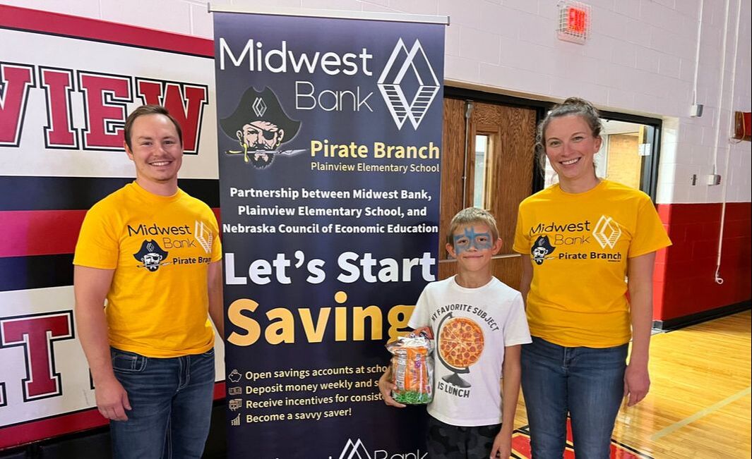 Midwest Bank staff celebrated the first day of operations at the new in-schools savings bank branch at Plainview Elementary School.