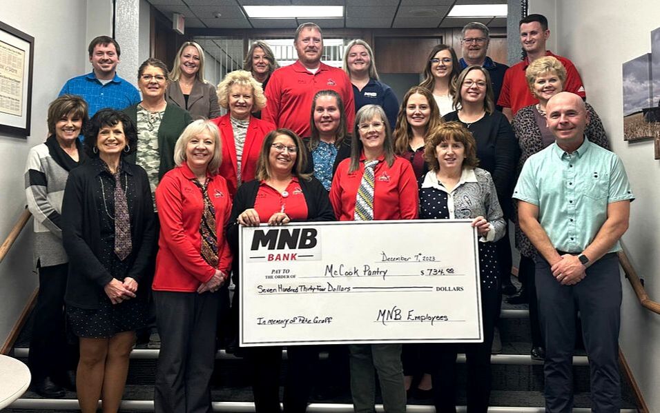 MNB Bank in McCook presented a check for $734 to the McCook Pantry.