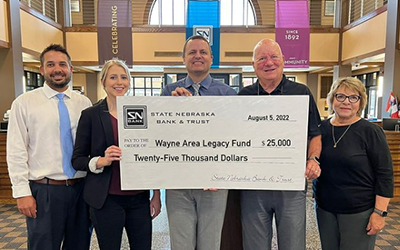 Staff from State Nebraska Bank & Trust in Wayne presented a check to the local Legacy Fund to help fund community projects and programs.